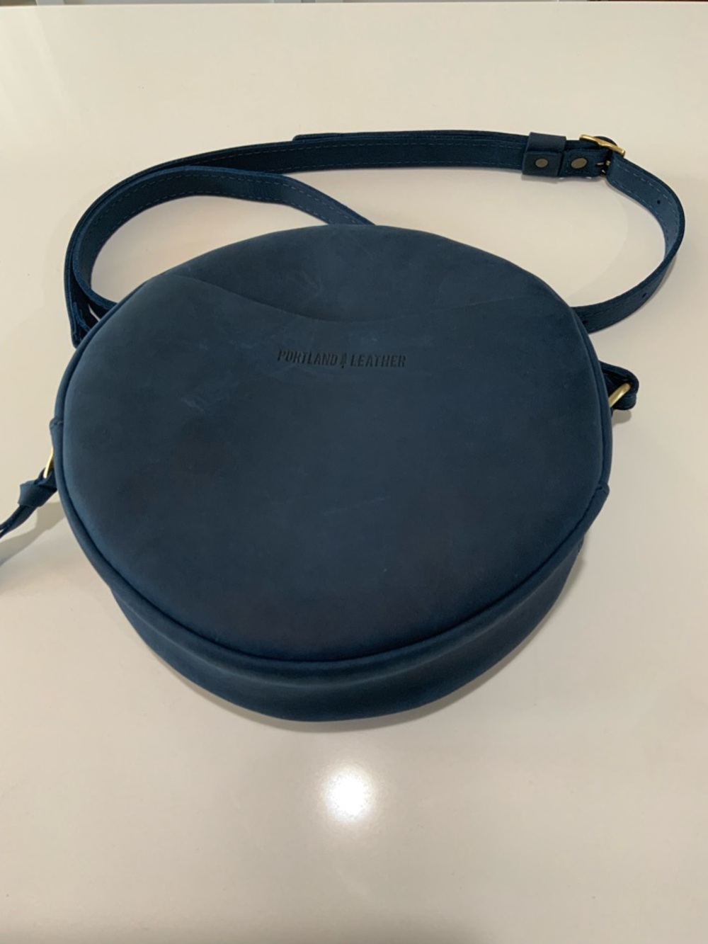 Portland Leather Round Crossbody Bag - navy blue